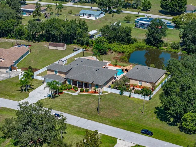 an aerial view of a house with a garden