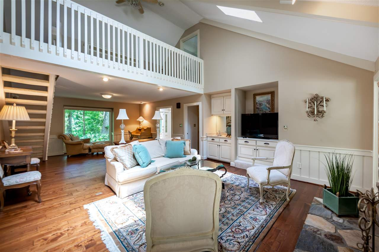 7931 Netherlands Drive Raleigh, NC 27606 - Photo 4 of 26 shows the loft and the openness of this flor plan. Family Room