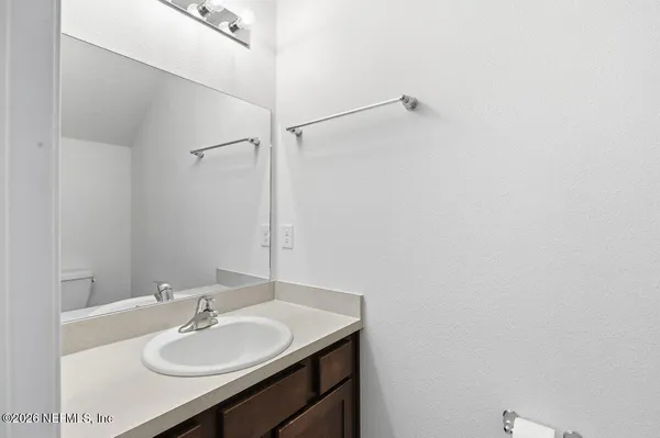 a view of a room with a hallway