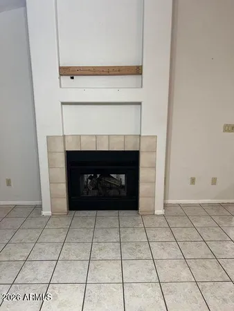 a living room with a fireplace