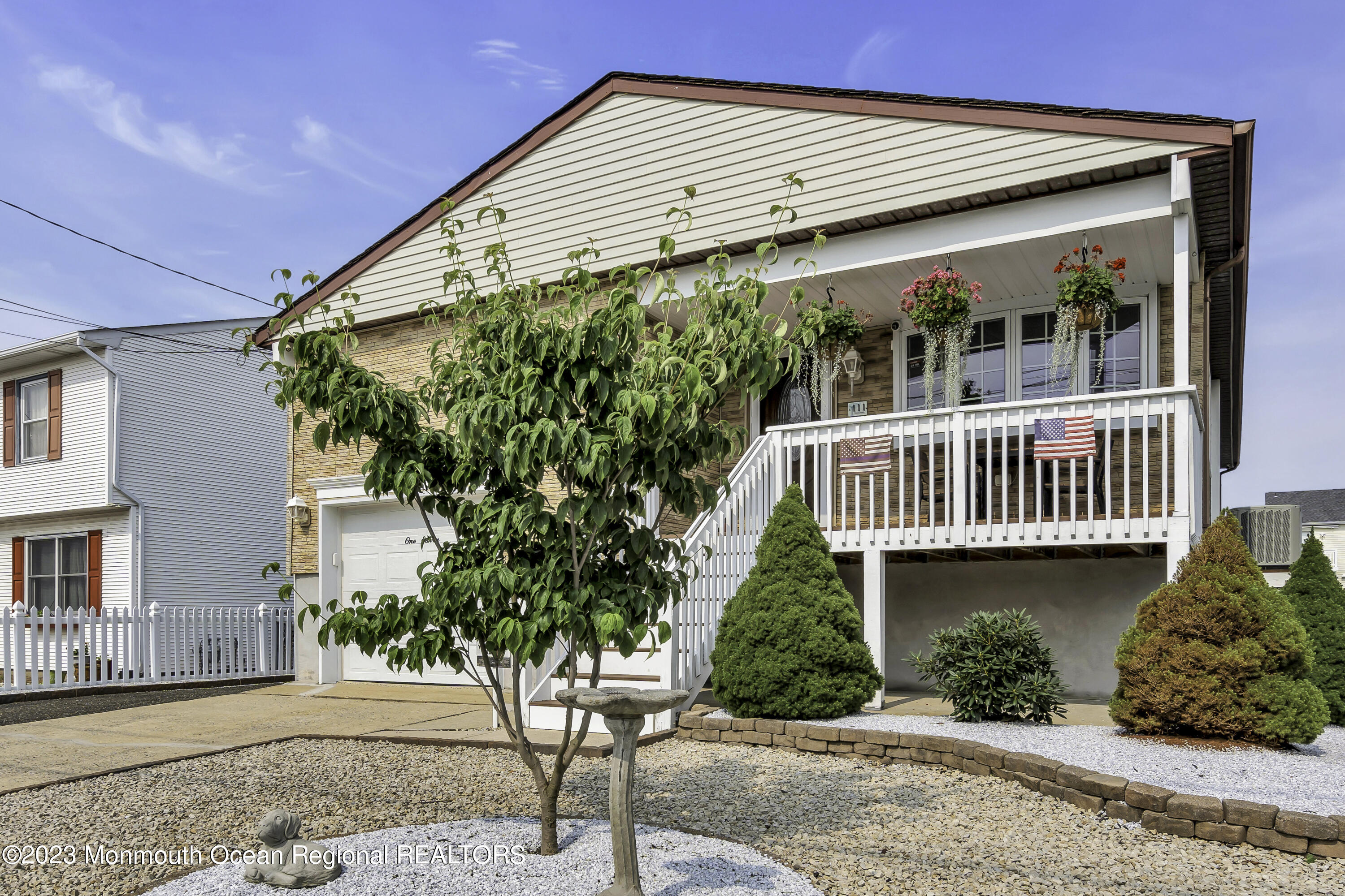 111 Mizzen Road Brick, NJ 08723 - Photo 3 of 52 a front view of a house with garden