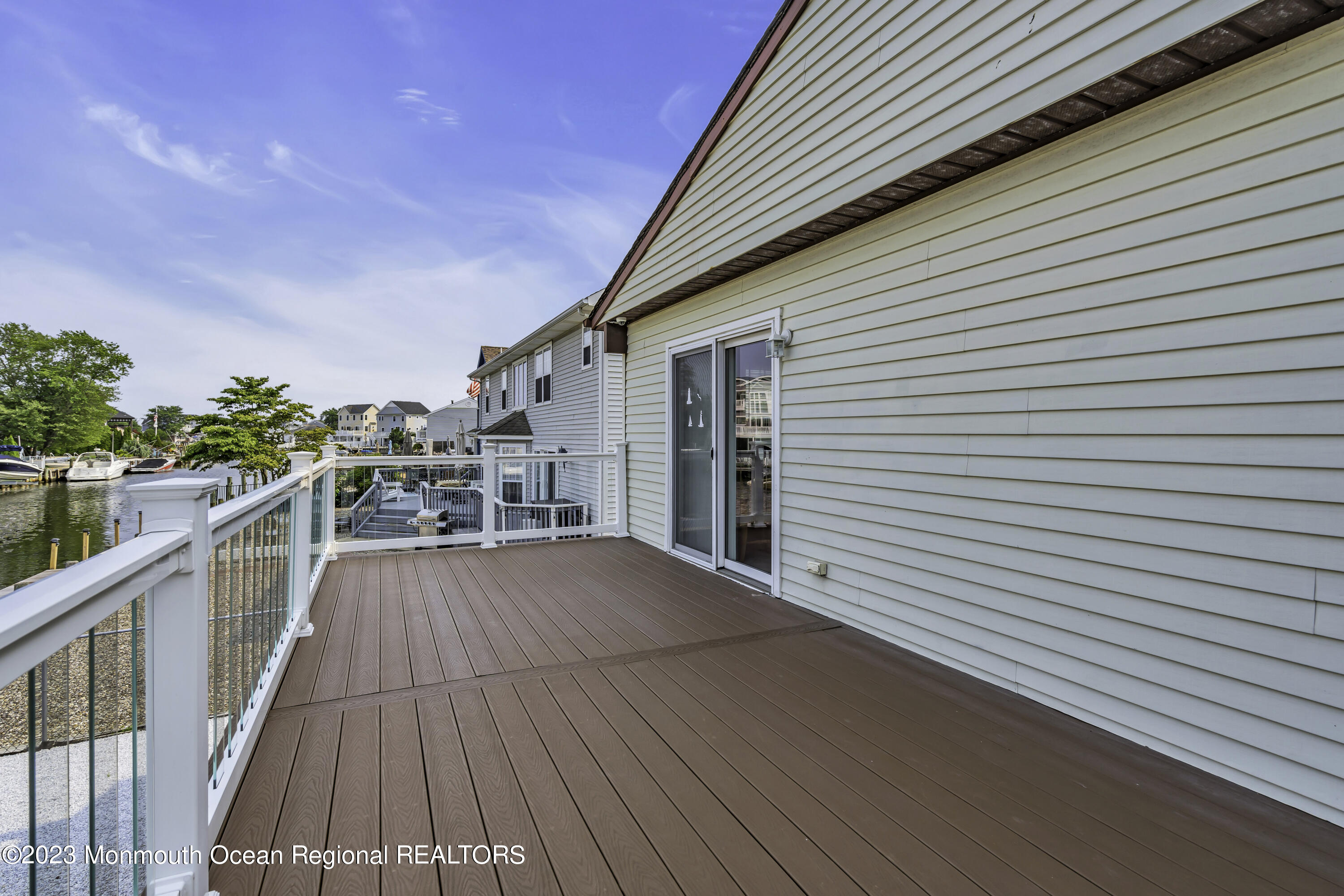 111 Mizzen Road Brick, NJ 08723 - Photo 31 of 52 a view of a terrace with wooden floor