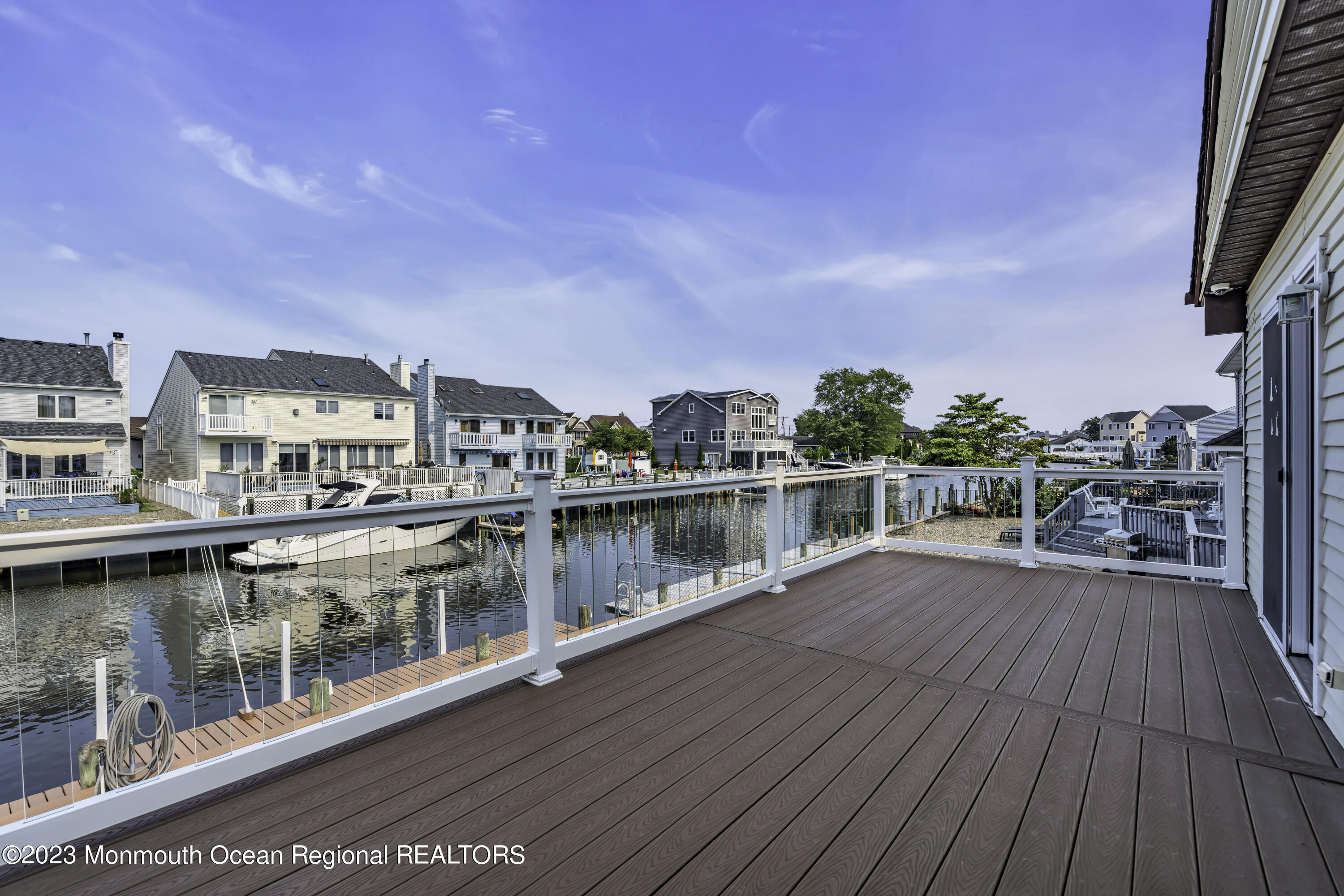 111 Mizzen Road Brick, NJ 08723 - Photo 32 of 52 a view of a house with wooden floor and lake view
