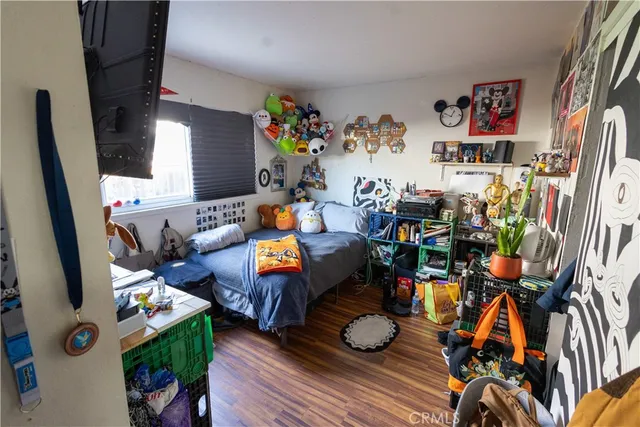 a very nice looking room with many windows and furniture