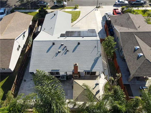 an aerial view of houses with outdoor space