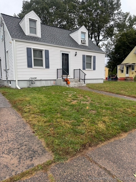 33 Westview Street Hamden, CT 06514 - Photo 2 of 14 a front view of a house with a yard