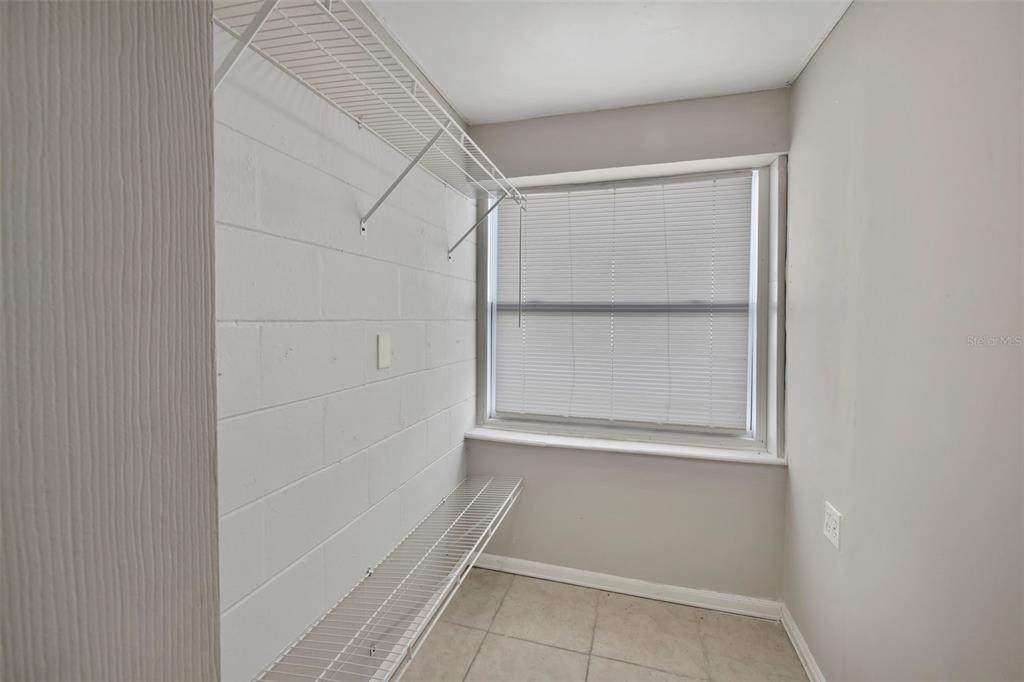 2331 West Oak Street Kissimmee, FL 34741 - Photo 11 of 34 a view of an empty walk in closet