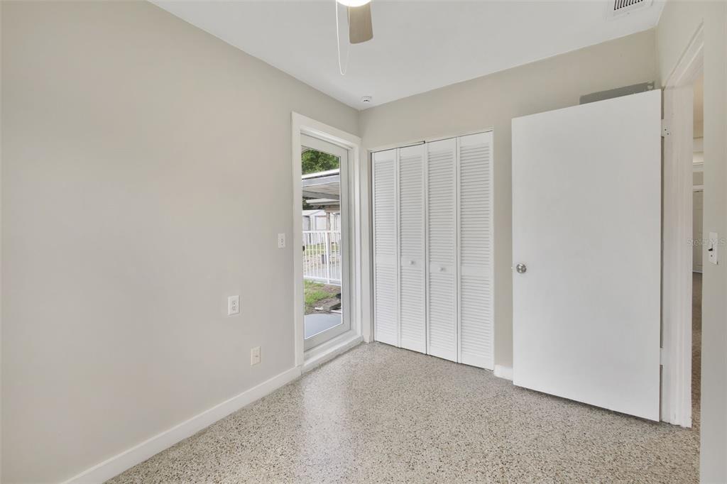 2331 West Oak Street Kissimmee, FL 34741 - Photo 18 of 34 a view of an empty room and window