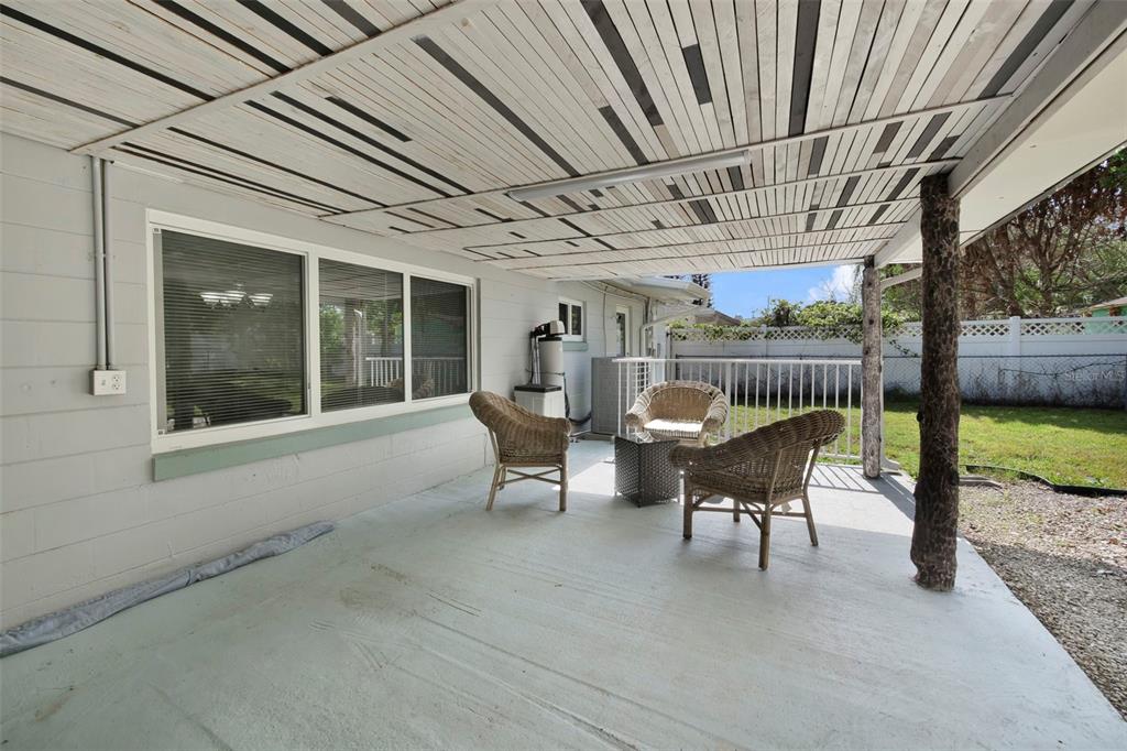 2331 West Oak Street Kissimmee, FL 34741 - Photo 21 of 34 a view of a porch with furniture