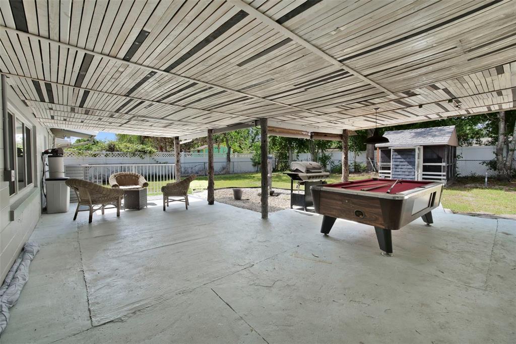 2331 West Oak Street Kissimmee, FL 34741 - Photo 22 of 34 a outdoor space with lots of furniture and white walls