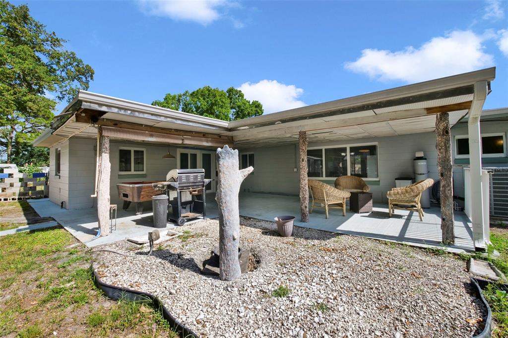 2331 West Oak Street Kissimmee, FL 34741 - Photo 23 of 34 a front view of a house with garden