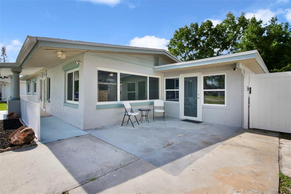 2331 West Oak Street Kissimmee, FL 34741 - Photo 26 of 34 a view of a house with outdoor seating