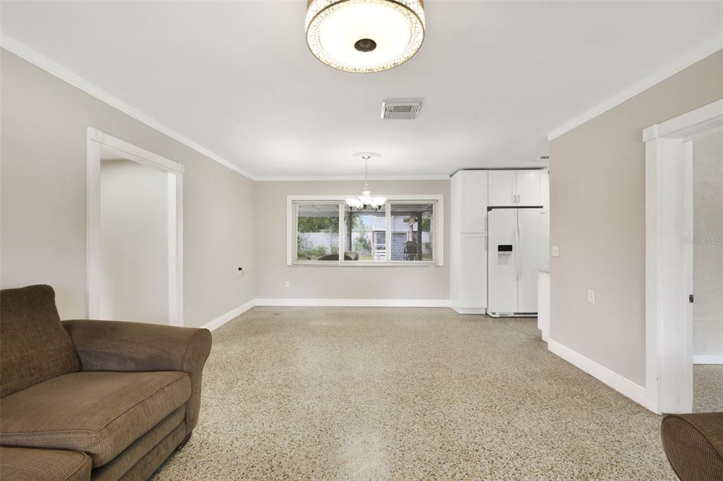 2331 West Oak Street Kissimmee, FL 34741 - Photo 30 of 34 a living room with furniture and a large window