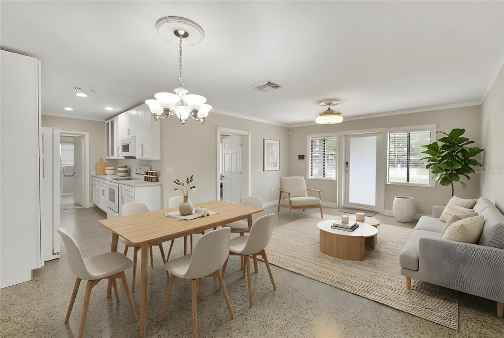 2331 West Oak Street Kissimmee, FL 34741 - Photo 3 of 34 a view of a dining room with furniture and chandelier