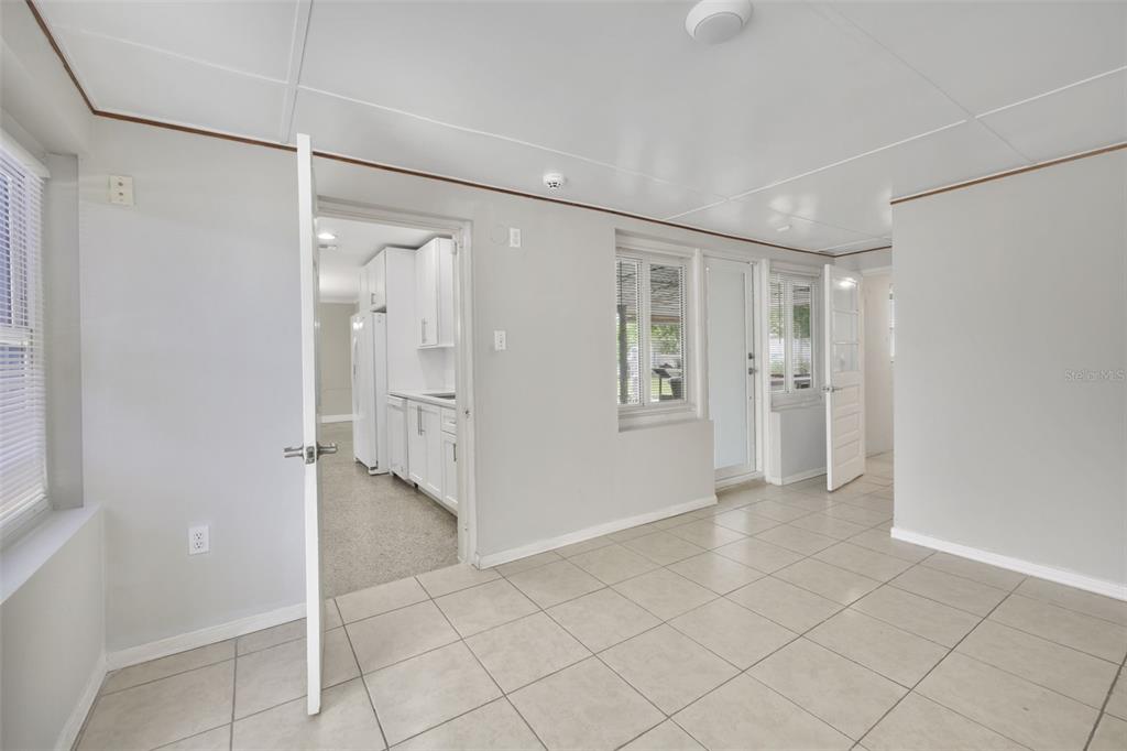 2331 West Oak Street Kissimmee, FL 34741 - Photo 9 of 34 a bathroom with a shower and a glass door