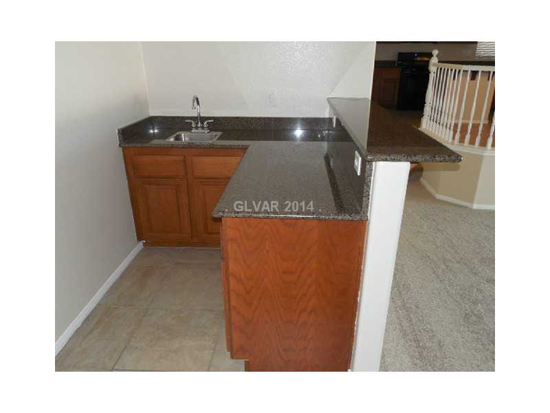 260 Quail Ranch Drive Henderson, NV 89015 - Photo 9 of 35 Family Room. Wet bar