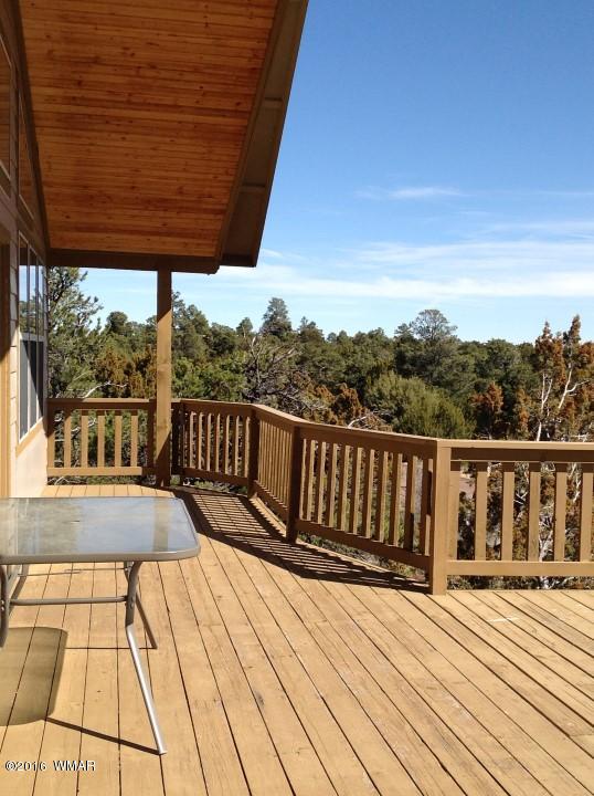 2972 Lodgepole Road Overgaard, AZ 85933 - Photo 14 of 41 a view of balcony with wooden floor
