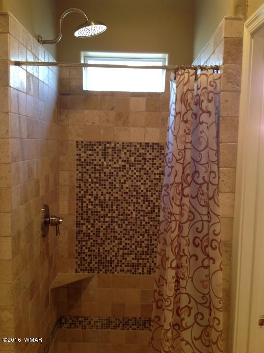 2972 Lodgepole Road Overgaard, AZ 85933 - Photo 33 of 41 a bathroom with a shower