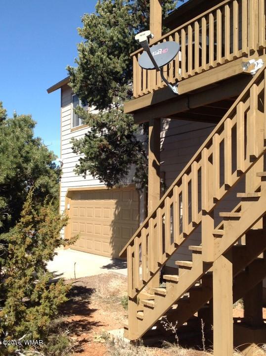 2972 Lodgepole Road Overgaard, AZ 85933 - Photo 40 of 41 a view of building with wooden stairs