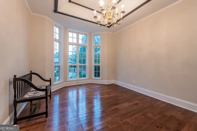 a kitchen with a sink a stove a refrigerator and cabinets