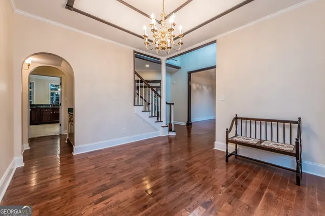 a kitchen with a sink and a stove