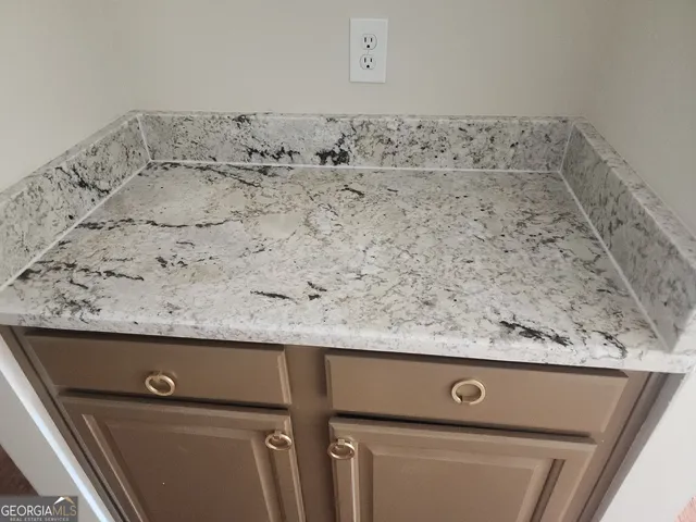 wooden floor in an empty room with window