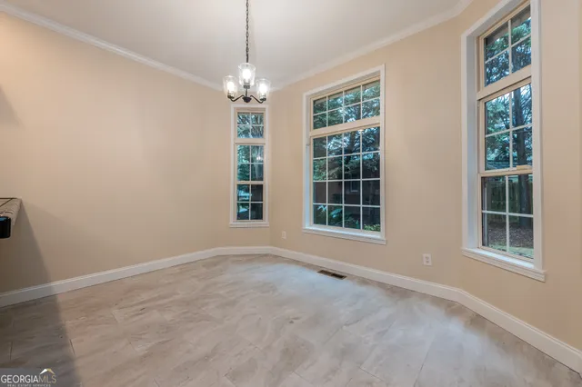 a bathroom with a sink and a mirror with bathtub