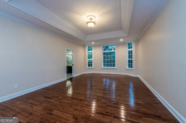 an empty room with a large window