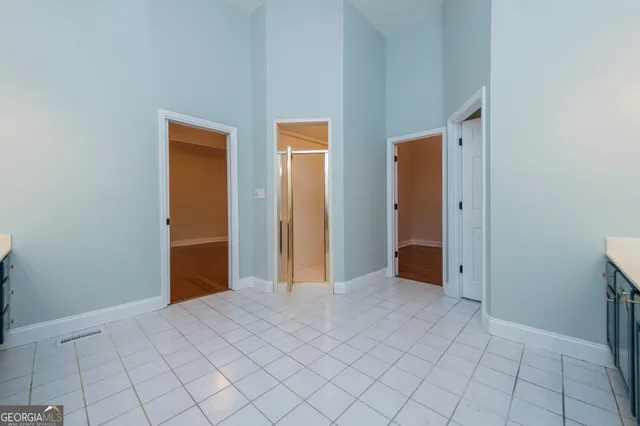 a bathroom with a sink a vanity and a mirror