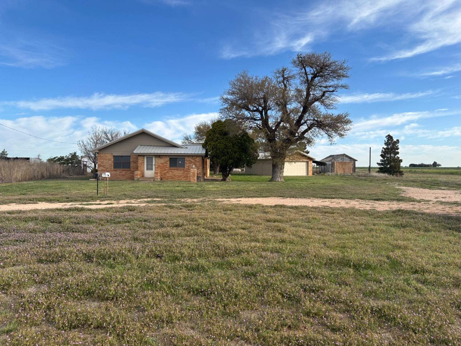 621 County Road 280 Post, TX 79356 - Photo 1 of 17 a view of a house with a big yard