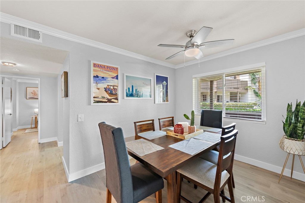 70 Corniche Drive, Unit A Dana Point, CA 92629 - Photo 6 of 27 a view of a dining room with furniture window and wooden floor