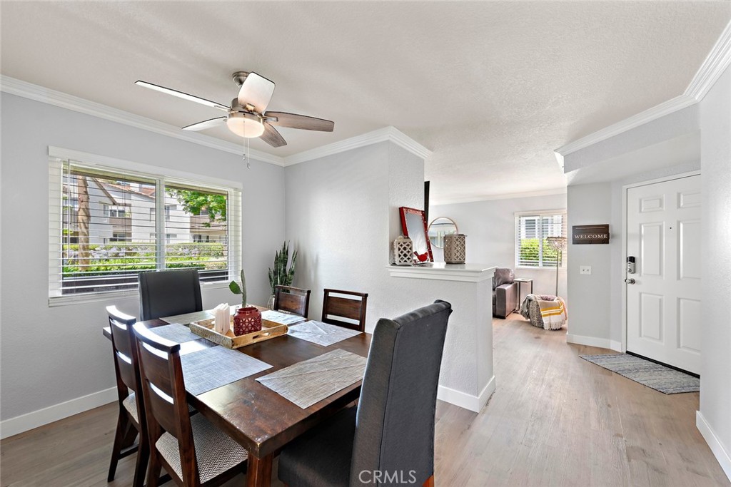 70 Corniche Drive, Unit A Dana Point, CA 92629 - Photo 7 of 27 a view of a dining room with furniture window and wooden floor