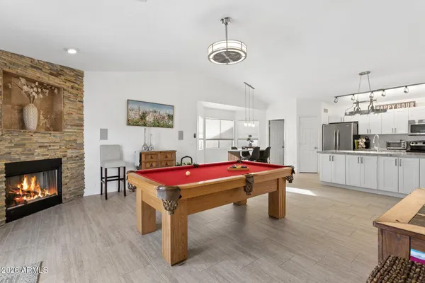 a bedroom with a bed and a chair