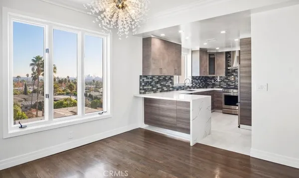 a bathroom with a sink and a large mirror