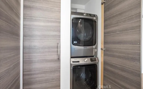 a close view of a utility room with washer and dryer