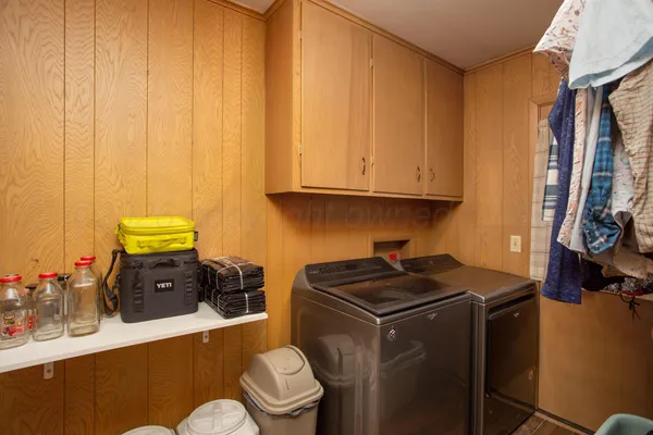 a bathroom with a sink a toilet and tub