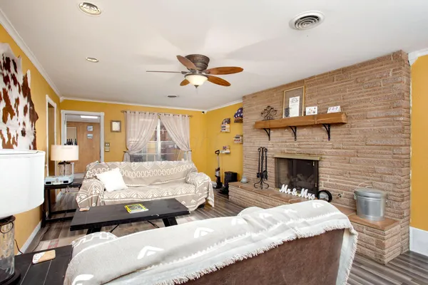 a bed room with a bed and a fireplace