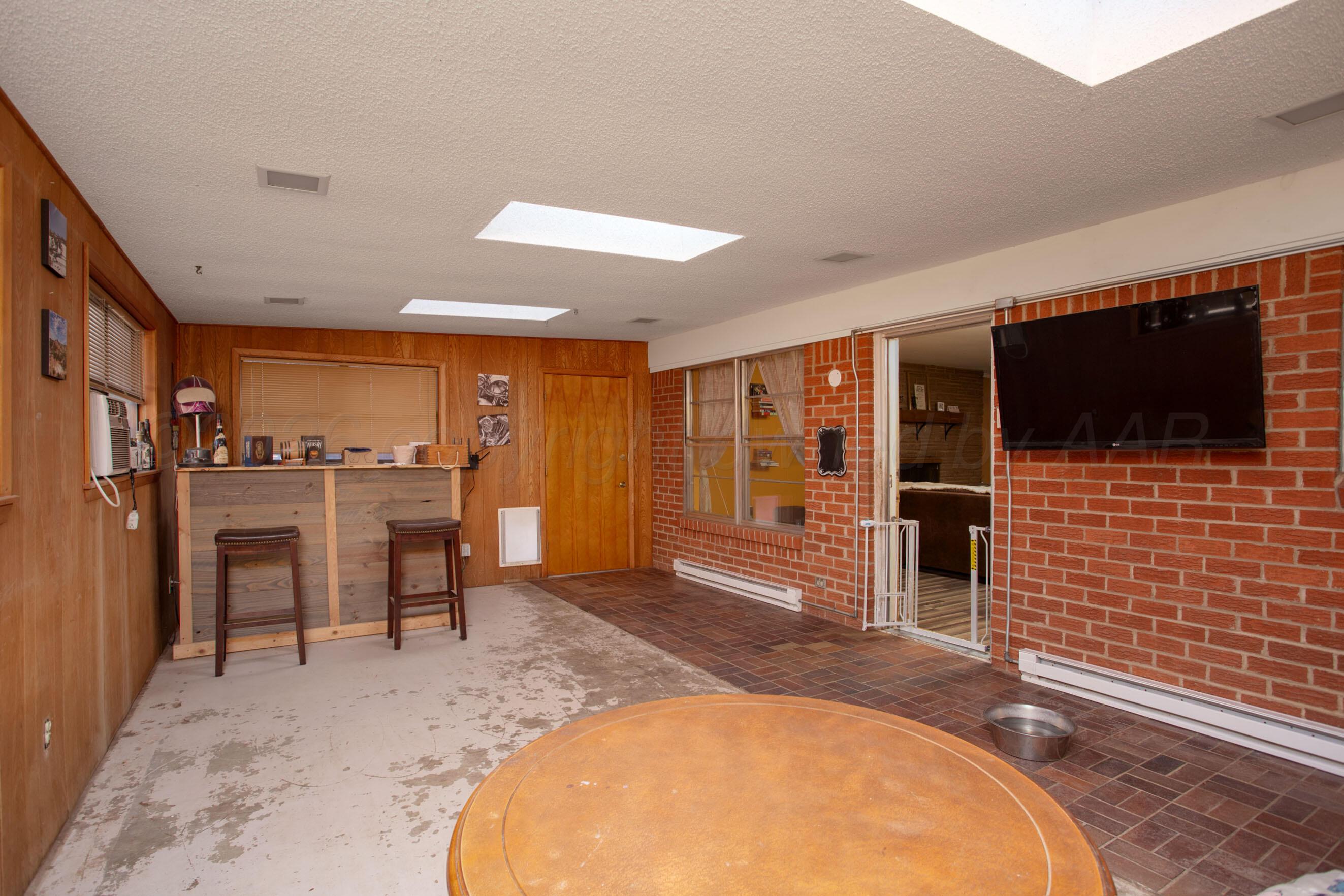 6204 Jameson Road Amarillo, TX 79106 - Photo 28 of 33 sunroom