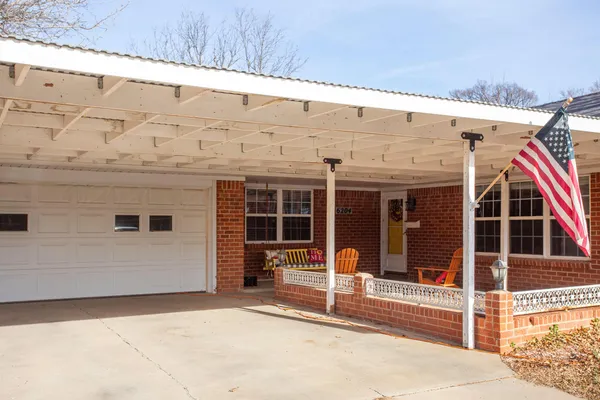 a view of a house with a door and a window