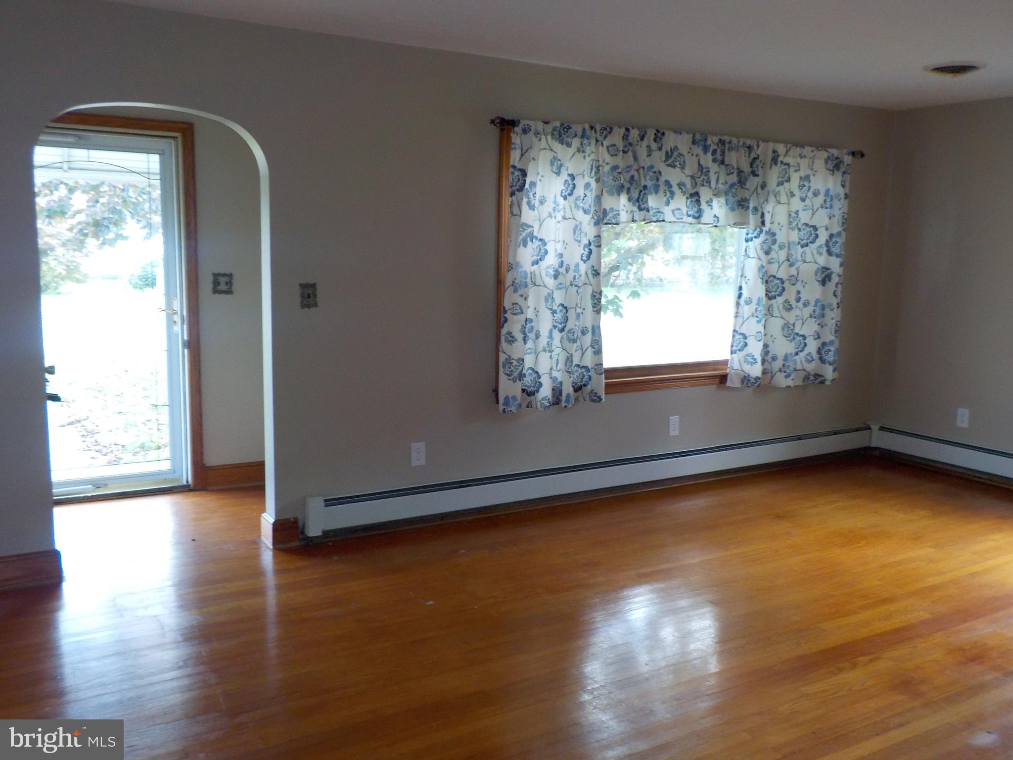 211 Crusader Road Cambridge, MD 21613 - Photo 2 of 25 Inviting Living room with beautiful wood floors