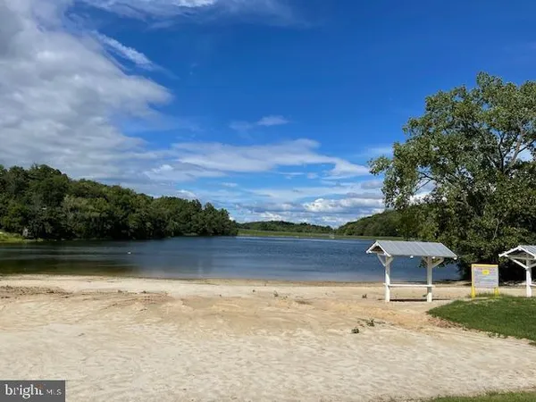 a view of a lake with a mountain in the background