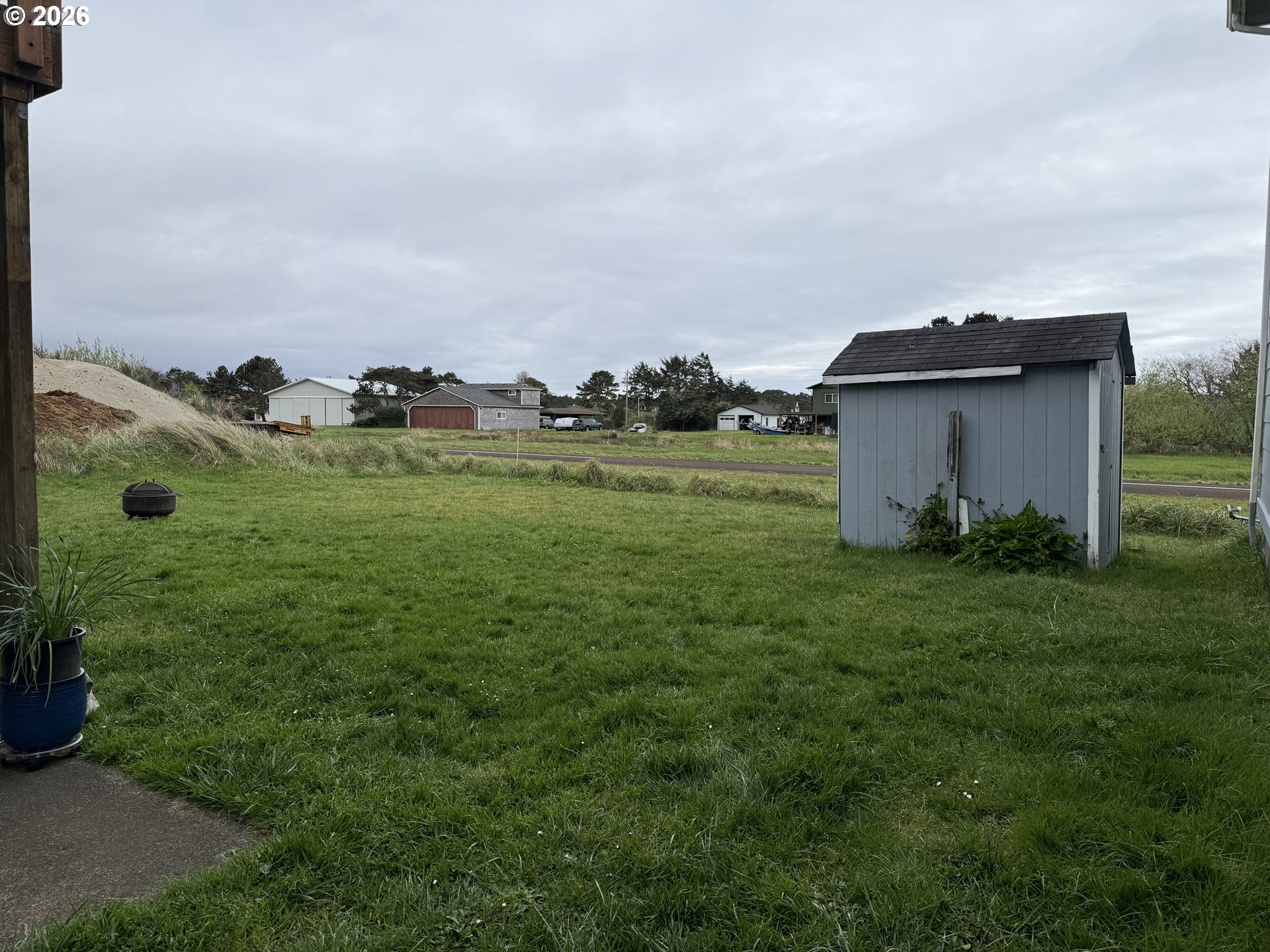 35390 Brooten Road Pacific City, OR 97135 - Photo 6 of 19 a view of a garden with a fountain