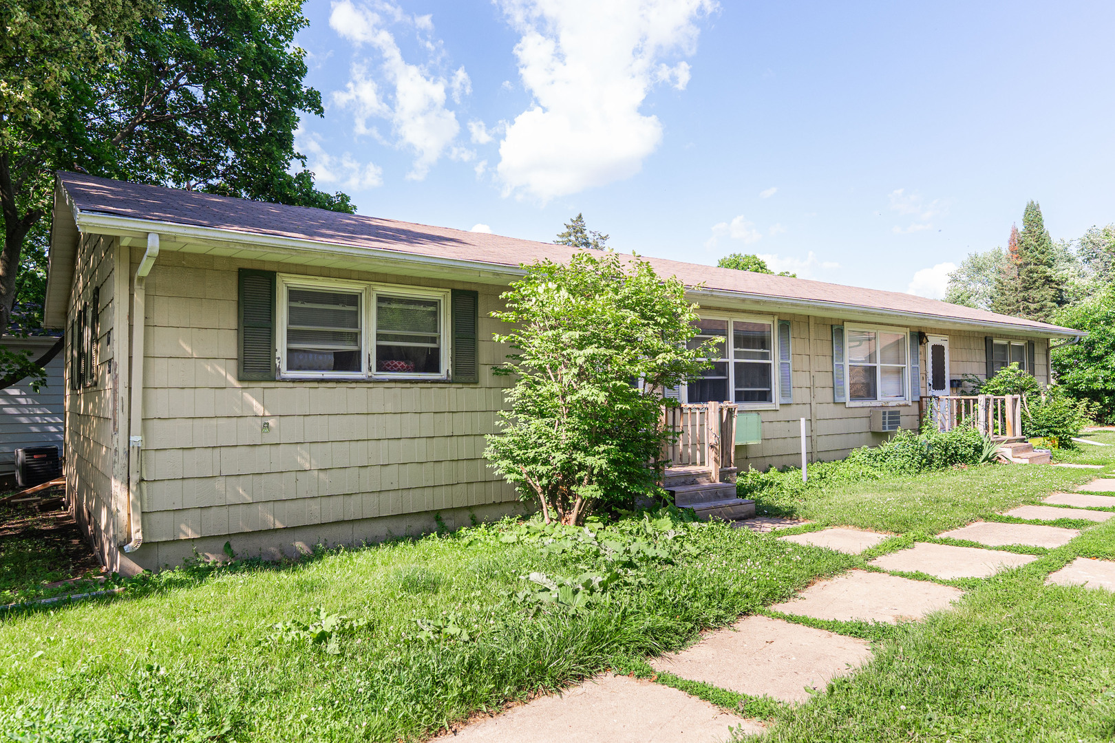 650 North 11th Street DeKalb, IL 60115 - Photo 2 of 9 a view of a house with a yard