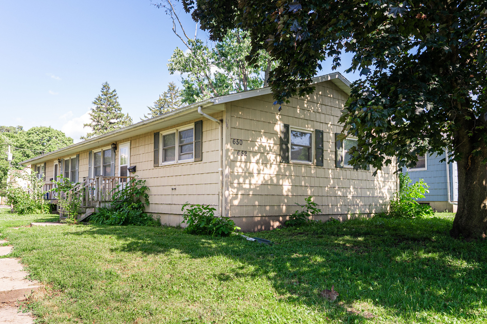 650 North 11th Street DeKalb, IL 60115 - Photo 4 of 9 a front view of house with yard and green space