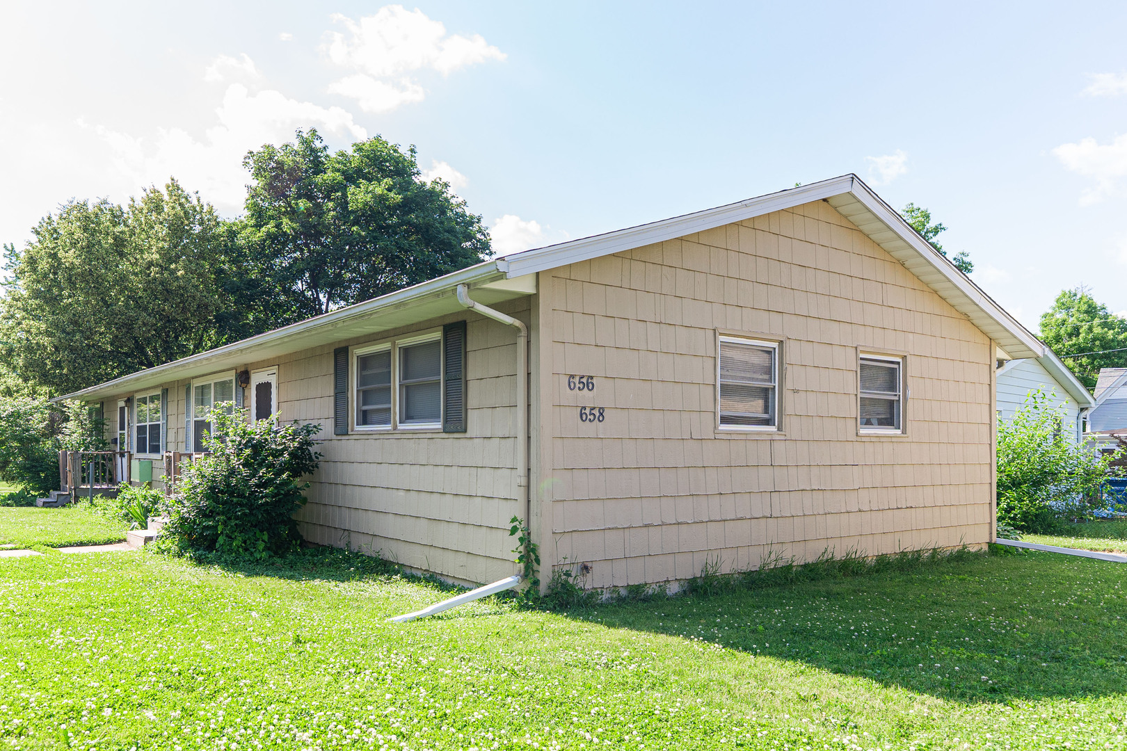650 North 11th Street DeKalb, IL 60115 - Photo 5 of 9 a view of a house with a yard