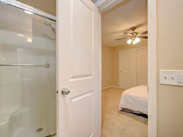 a bathroom with a sink toilet and a mirror