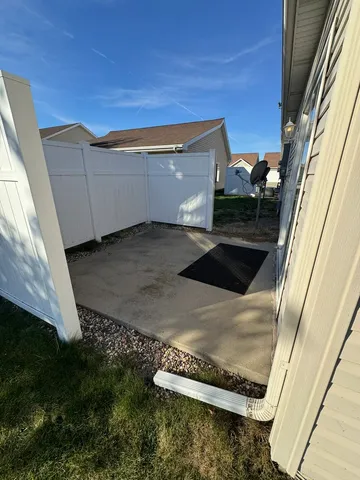 a view of a backyard of the house