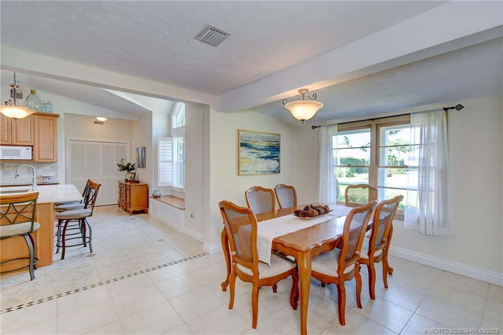834 Southeast Riverside Drive Stuart, FL 34994 - Photo 10 of 35 Dining room off kitchen