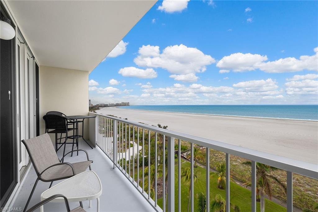 140 Seaview Court, Unit S902 Marco Island, FL 34145 - Photo 18 of 24 a view of a chairs and table in patio