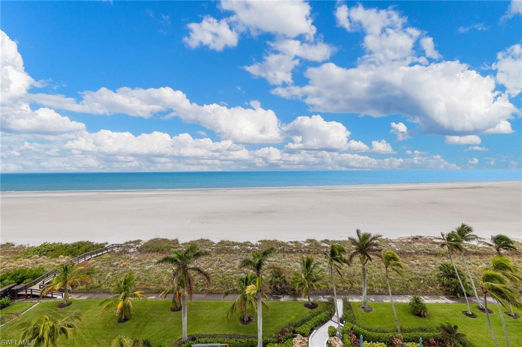 140 Seaview Court, Unit S902 Marco Island, FL 34145 - Photo 19 of 24 a view of a lake and mountain in the back